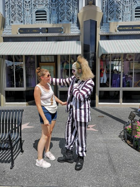 I&B's Founder posing with Beetlejuice