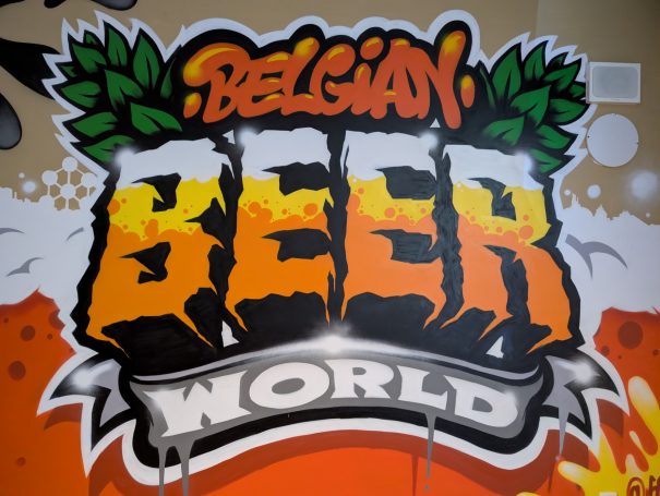 Colourful mural featuring the text "Belgian Beer World" in bold, stylised letters.
