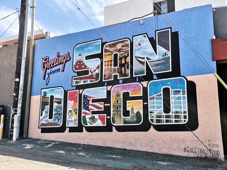 Colourful mural featuring the words "Greetings from San Diego" with various local images.