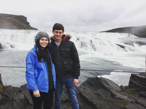 I&B's Founder & Husband posing in front of the large waterfall, known as Gullfoss Falls, Iceland.
