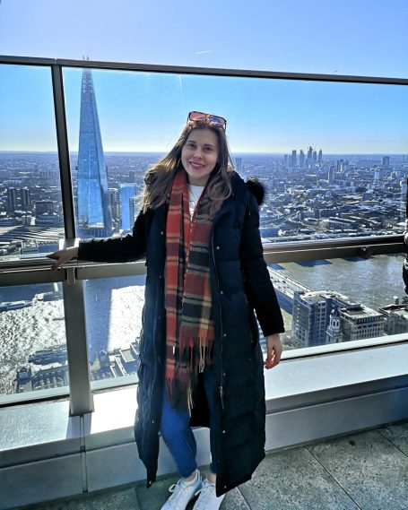I&B's Founder posing on top of the Sky Garden with the London skyline and The Shard in the background