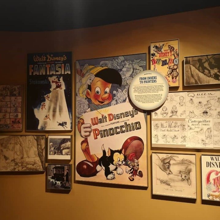 A collection of vintage Disney artwork and posters featuring Pinocchio.