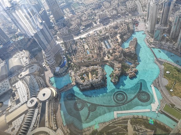 View from above showcasing the Burj Khalifa and surrounding water features in Dubai.