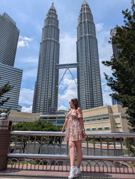I&B's Founder posing in KLCC park in front of the Petronas Towers in Kuala Lumpur