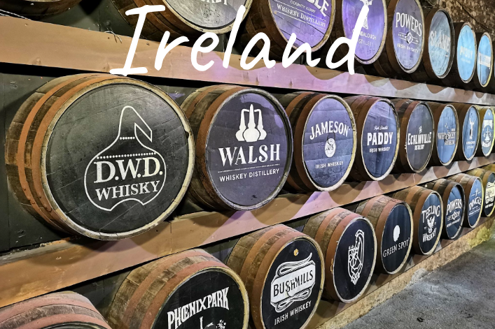 Barrels with labels from various distilleries in Ireland.