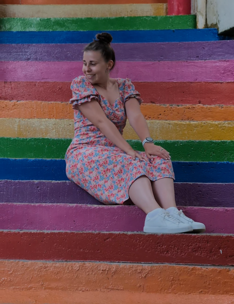 I&B's Founder posing on colourful steps by Chin Swee Caves Temple