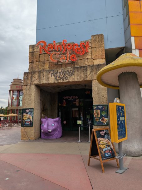 Entrance to Relaxing Café with an ornate stone facade and decorative signage.