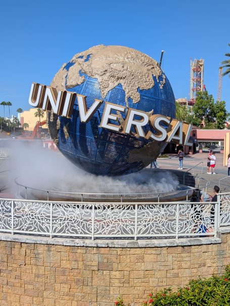 Globe with "Universal" logo in front of the Universal Studios entrance.