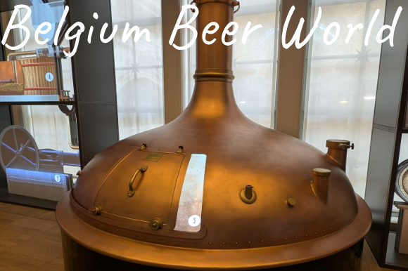 Large copper brewing kettle at the Belgium Beer Experience exhibit.