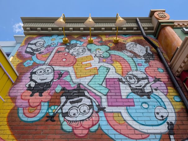 Colourful mural featuring cartoon characters and the word "Hello" in vibrant graffiti style.