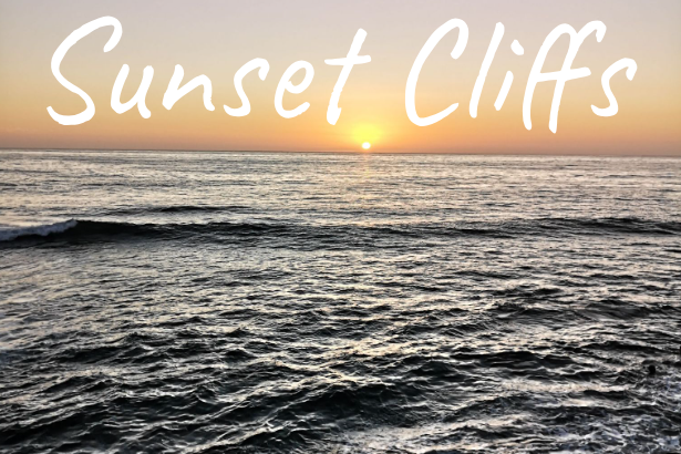Sunset over waves at Sunset Cliffs, with a warm, golden sky.