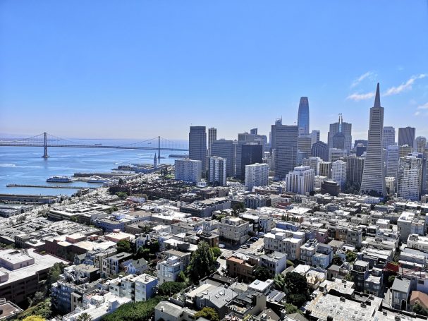 A panoramic view of San Francisco's skyline with the bay in the background.