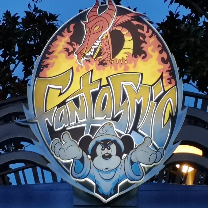Sign featuring Mickey Mouse and a dragon for the "Fantasmic!" show.