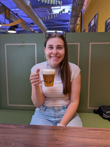 I&B's Founder posing with a Butterbeer at Warner Bros studio tour London.