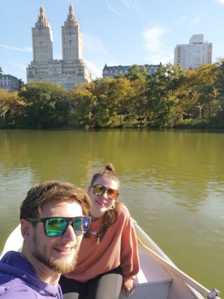 I&B's Founder & Husband on a rowboat on The Lake in Central Park with the New York Skyline in the background.