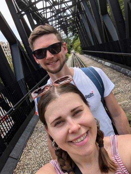I&B's Founder & Husband posing on a railway bridge on Singapore's Rail Corridor.