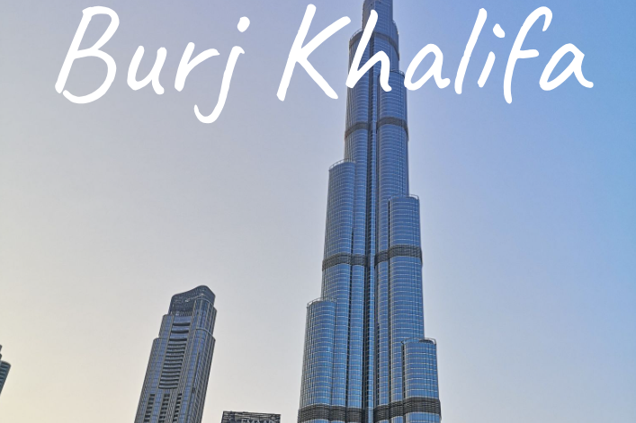 Tall, modern skyscraper, Burj Khalifa, set against a clear sky.