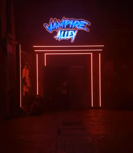 Neon sign reading "Vampire Alley" above a scare maze entrance at Halloween Horror Nights at Universal Studios, Singapore.