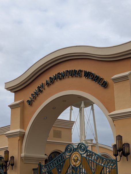 Entrance archway of a theme park with "Parker Adventure Center" sign.