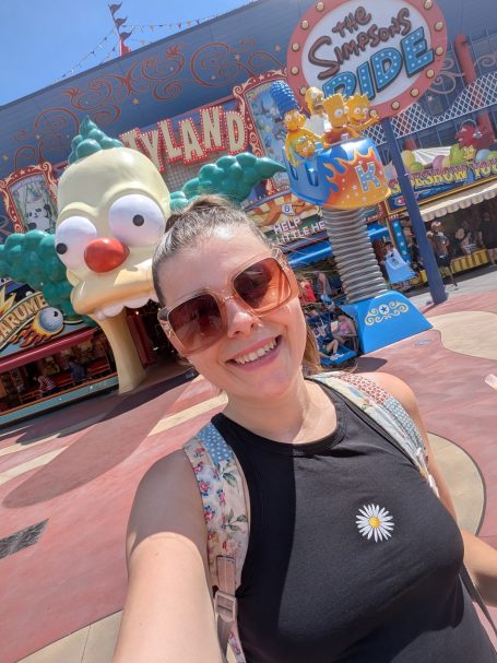 I&B's Founder posing in front of The Simpsons Ride at Universal Studios Orlando