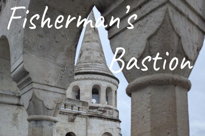 View of Fisherman's Bastion with ornate stone architecture and a tall tower in Budapest